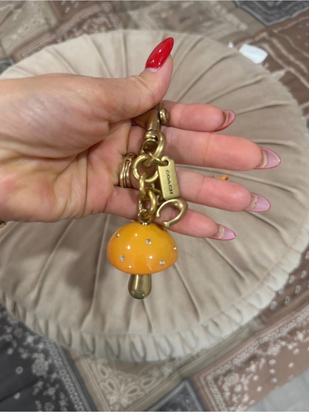 Coach Orange Mushroom Charm Keyring with Gold Hardware